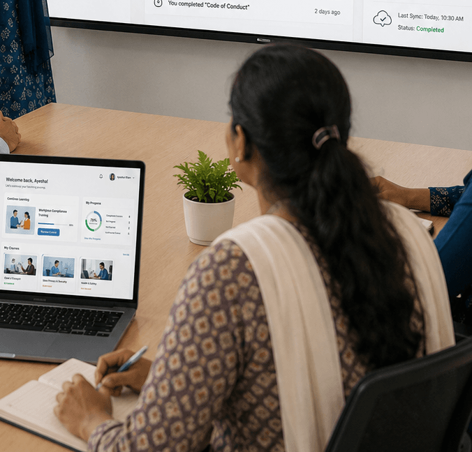 A facilitator presenting workplace training to colleagues around a conference table